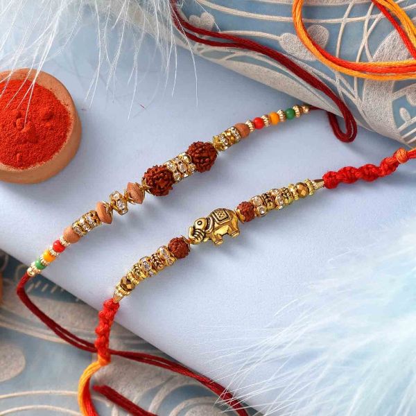 Exquisite Rudraksh and Pearl Rakhis Set Of 2 – 12 Pcs Pack