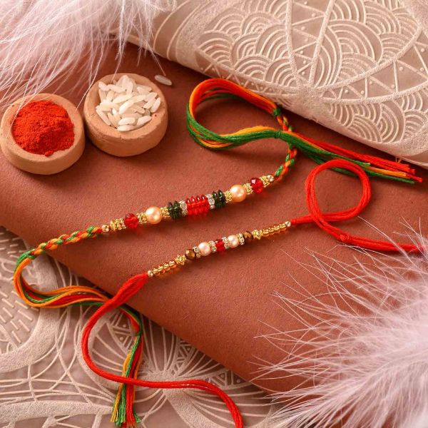 Glamorous Pearl and Crystal Bead Rakhis Set Of 2 – 12 Pcs Pack