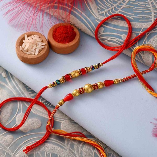 Magnificent Beaded Om Rakhis Set Of 2 – 12 Pcs Pack